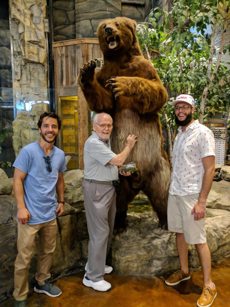 Papa, Mike, and I, exploring Bass Pro Shops.